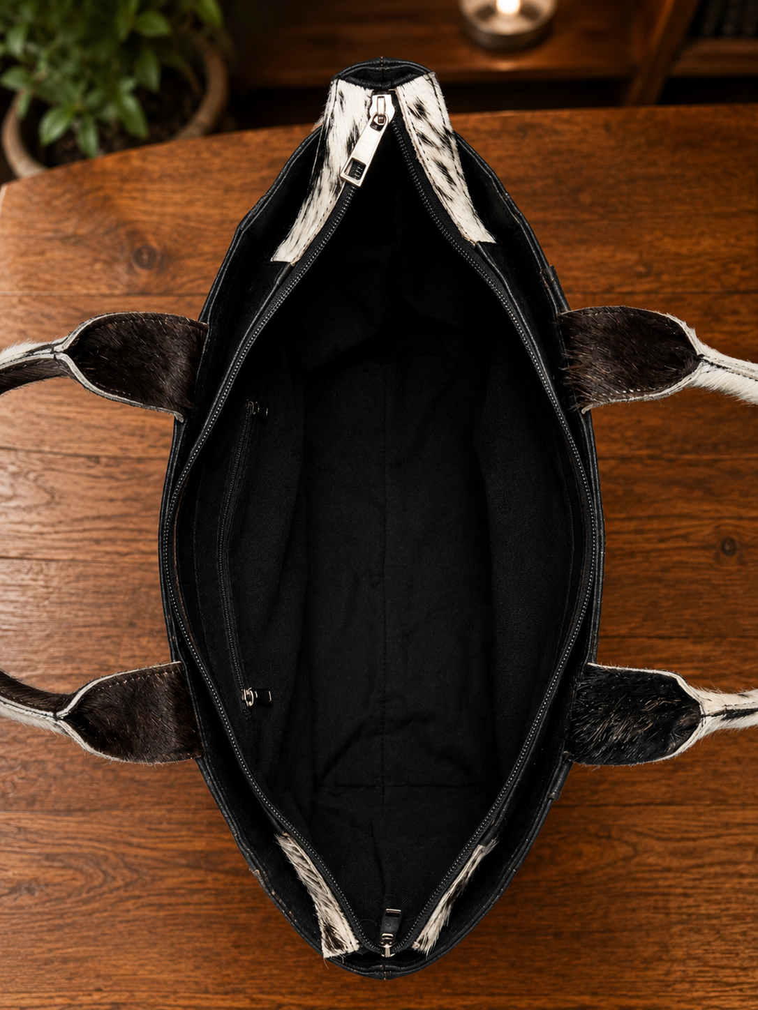 Hair-on Cowhide Backpack Purse Inside Table